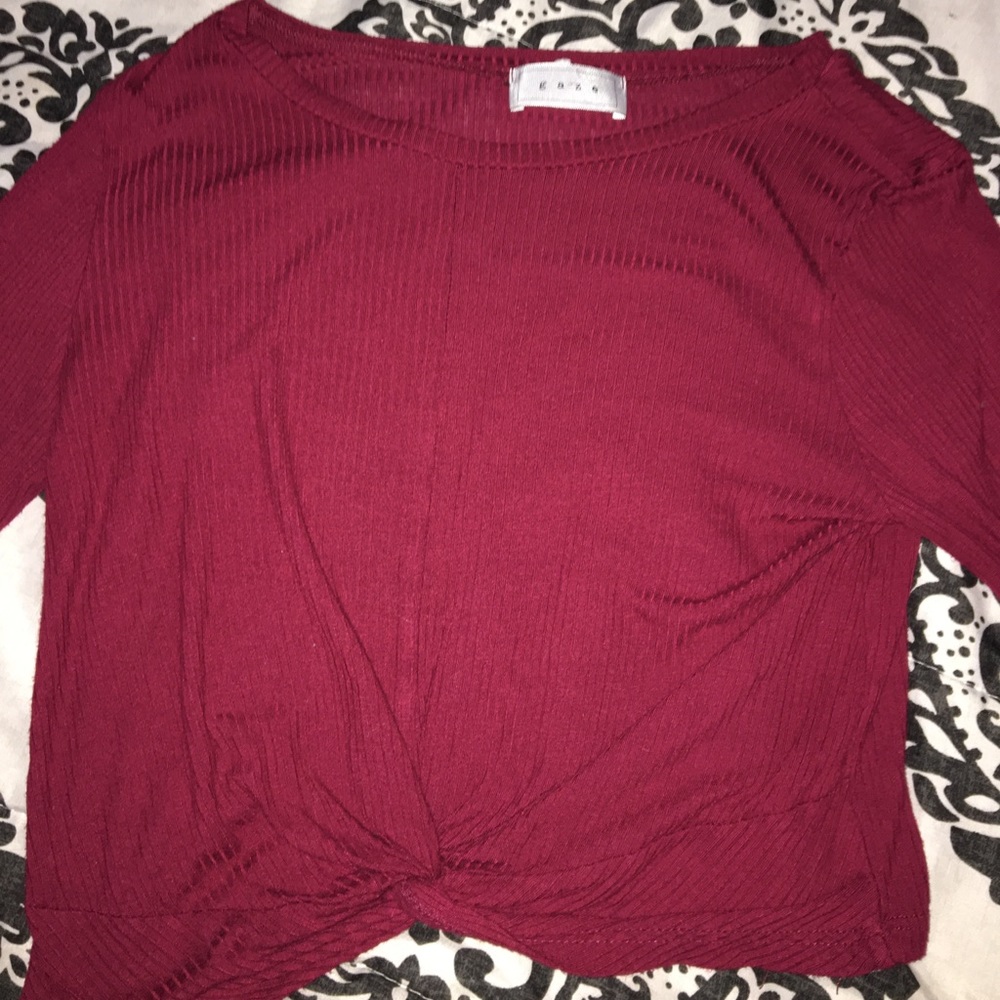 A long sleeve with a cute knot at the bottom